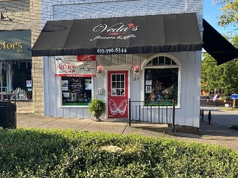 Store front of Veda's