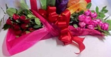 One Dozen Roses bundled in paper Roses