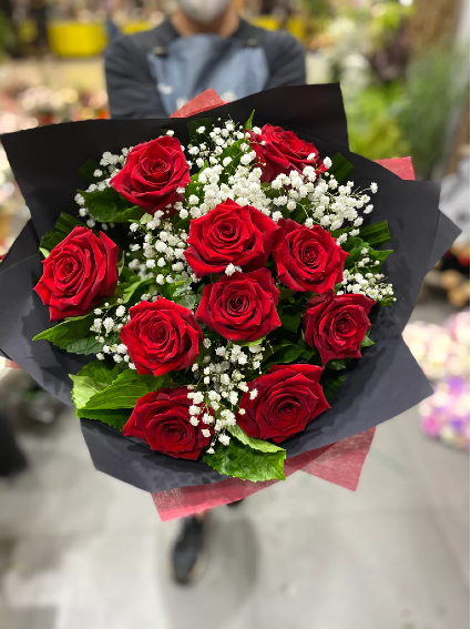 Red roses wrapped bouquet  