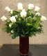 1 Dozen White Roses With Winter Greens Red Vase Arrangement