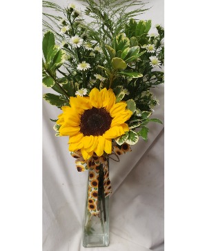 1 sunflower in a vase with filler 