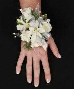 Wrist corsages done in a modern wire bracelet style