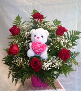 flowers with stuffed animal