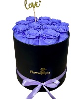 12 PRESERVED LAVENDER ROSES IN A ROUND BOX Preserved Roses
