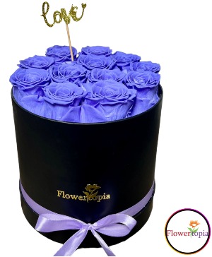12 PRESERVED LAVENDER ROSES IN A ROUND BOX Preserved Roses