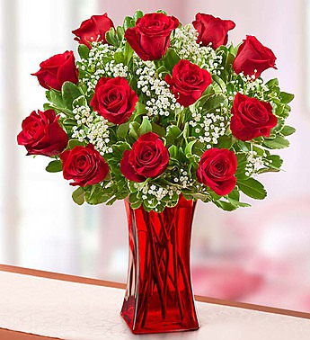 12 red roses in gathering red vase 