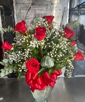 12 red roses in vase 