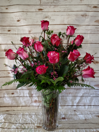 18 Lavender roses vase arrangement with fern and waxflower