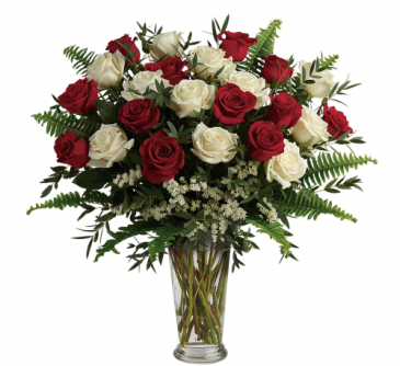 2 dozen roses in a vase