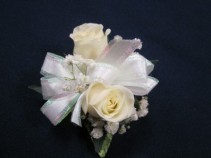 2 Rose Corsage, $20.00 Available in white, red, yellow, pink, orange