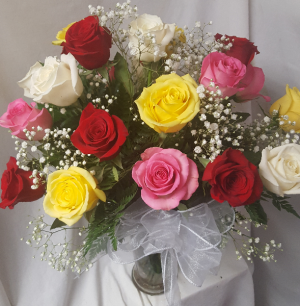 21 mixed colored roses arranged in a vase with baby breath! POPULAR FOR 21ST BIRTHDAY!!