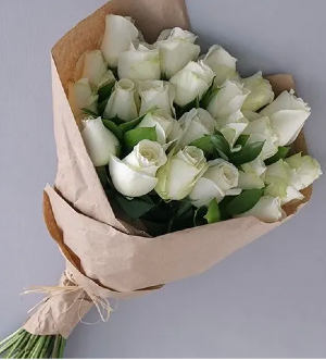 24 Wrapped Whites White roses bouquet