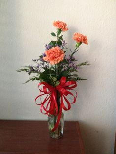 3 carnations in a Bud Vase 