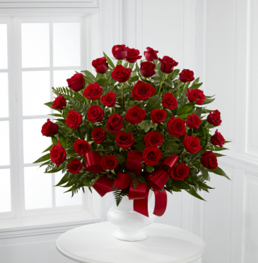 3 dz red roses in a basket