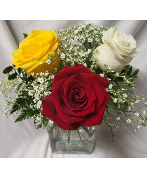3 mixed roses arranged with seasonal filler (Roses could vary in color depending on stock)