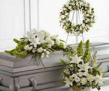 3 PC WHITE PURITY FUNERAL PACKAGE CASKET, WREATH, AND LARGE FLOOR/PEDESTAL ARRANGEMENT