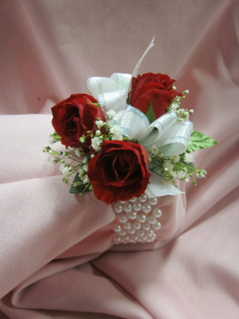 3 Rose Corsage on Pearl Wide Band, $35.00 