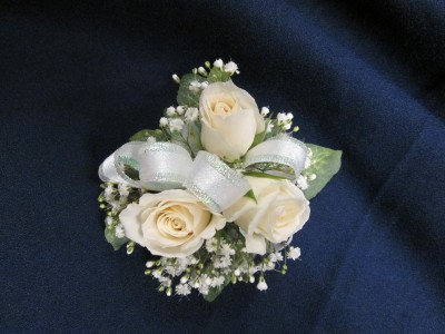 3 Rose Corsage Round Style, $25.00 Red, Yellow, Pink, Orange also available