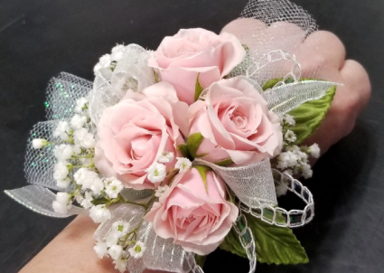 4 pink rose corsage with babies breath 