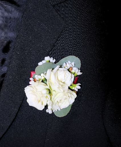 White spray roses with Wax Flower Pocket Boutonniere