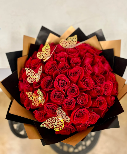 48 RED ROSES WRAPPED WITH GOLD BUTTERFLIES 