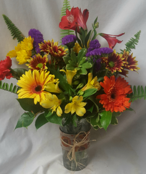 "Autumn Charm Bouquet" sesaonal mixed flowers in a vase with fall ribbon detail and raffia wrap