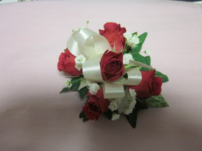 5 Rose Corsage, $30.00 Available in white, yellow, orange, pink, red