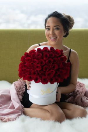 50 FRESH ROSES IN A WHITE HAT BOX