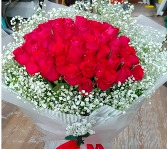 50 roses wrap with baby's breath  Specialty Wrapping in Laurel, Maryland | Lea's Flower Shop