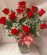DOZEN RED ROSES WITH HEART PIC ARRANGED IN A VASE WITH BABY'S BREATH AND BOW!