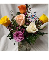 6 mixed roses with a seasonal filler flower Arranged in a vase...includes birthday pic too! (Rose colors may differ depending on daily stock)