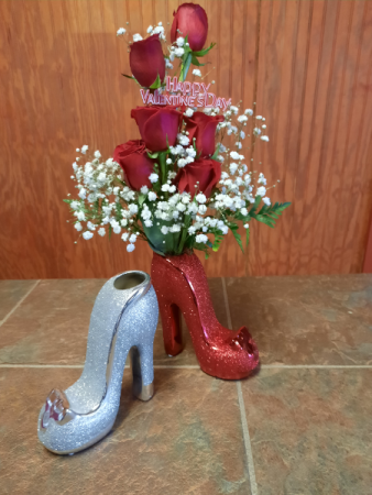 6 roses arranged in a high-heel shoe 