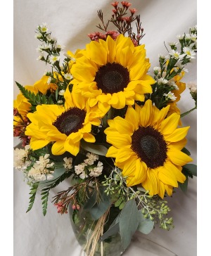 6 sunflowers in a vase with filler 