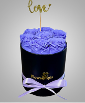 7 PRESERVED LAVENDER ROSES IN A ROUND BOX Preserved Roses