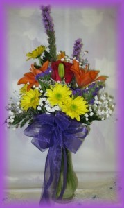 A Bright Hello Buds 'n Bows Vase Arrangement