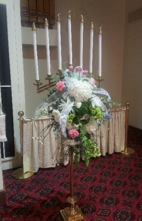 A Candleabra Spray Rental With Flowers