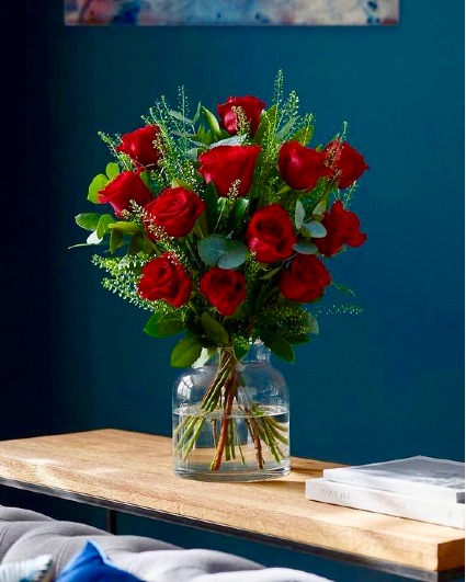 A Dozen Roses in a  Vase  