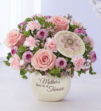 A MOTHER'S LOVE PINK AND LAVENDER FLOWERS IN CANISTER