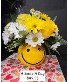 A Smile A Day Smiley face container fresh floral arrangement