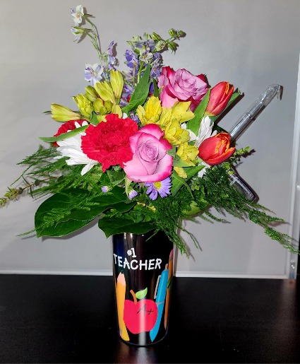 A teacher touches a heart Fresh Floral design