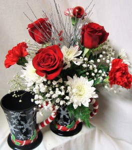 Tall Snowflake mug with Red roses, white cushion poms, baby's breath, peppermint carnations and some bling!!
