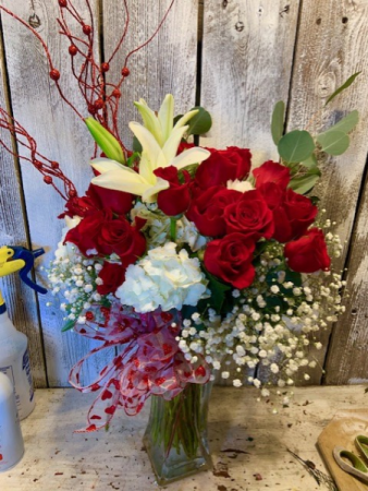 All time Elegance red roses/lillies/and filler