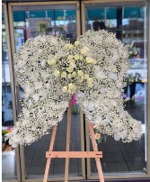 All White Angel Wings On A Easel 