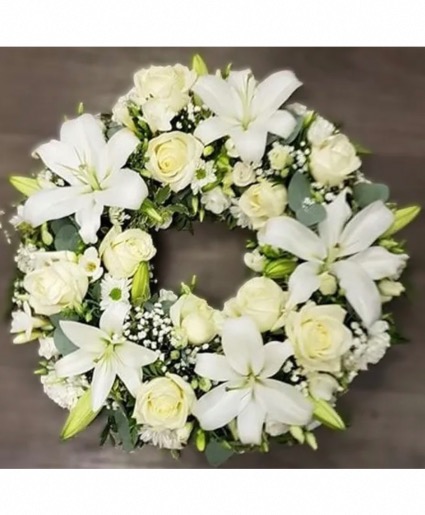All white flowers mixed flowers with lilies Funeral Wreath