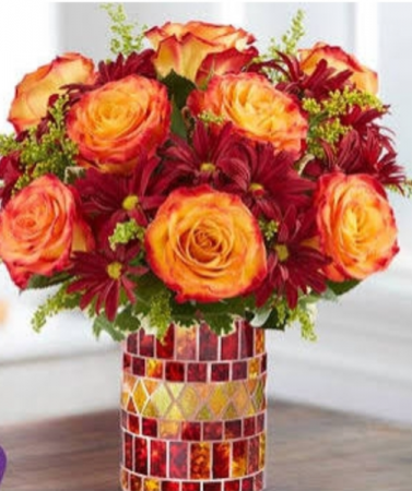 Amber waves Orange roses and fall pomps