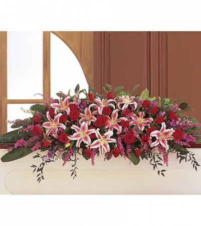 Amethyst and Ruby Cskt Spry One-Sided Floral Arrangement