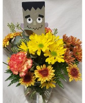 HALLOWEEN BOUQUET....BRIGHT FALL FLOWERS With a wooden Halloween pic!