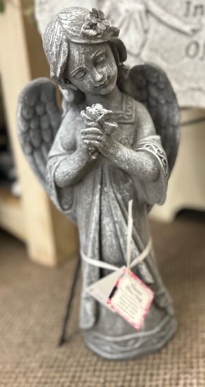 Angel holding a rose  