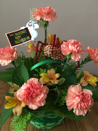 arachophbia basket arrangmentwith asst seasonal flowers