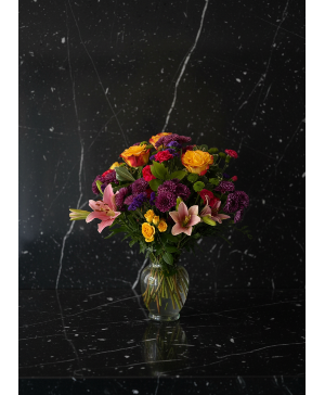 Arrangement of roses and lilies 